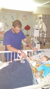 Easton and his father after their surgeries. 