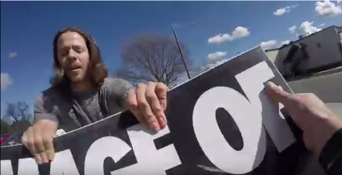 Post abortive man grabs avolitionist sign abortion prolife 2