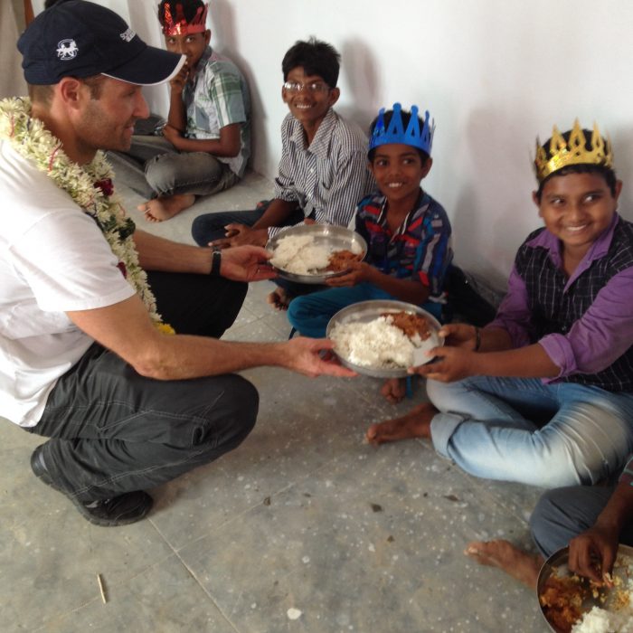 Rick Hinnant serving food to orphans in India.